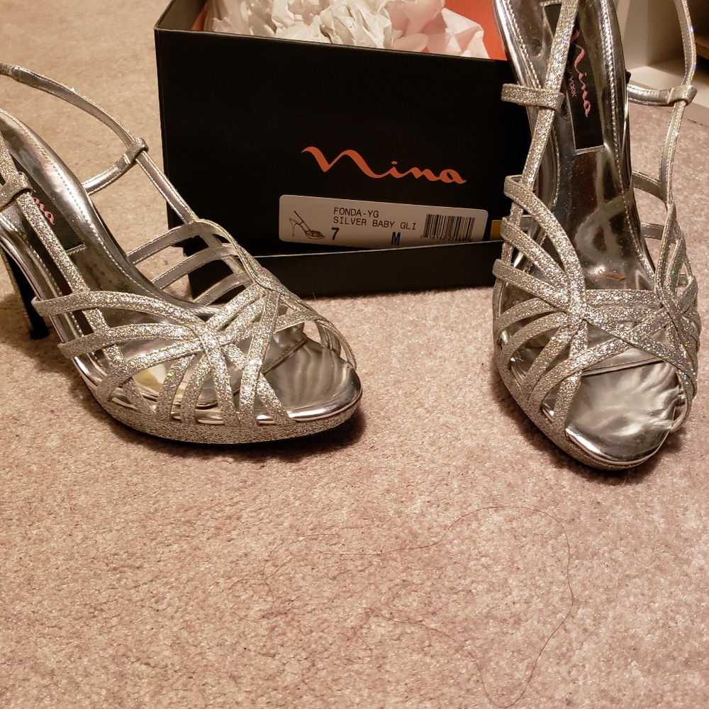Silver high heel shoes